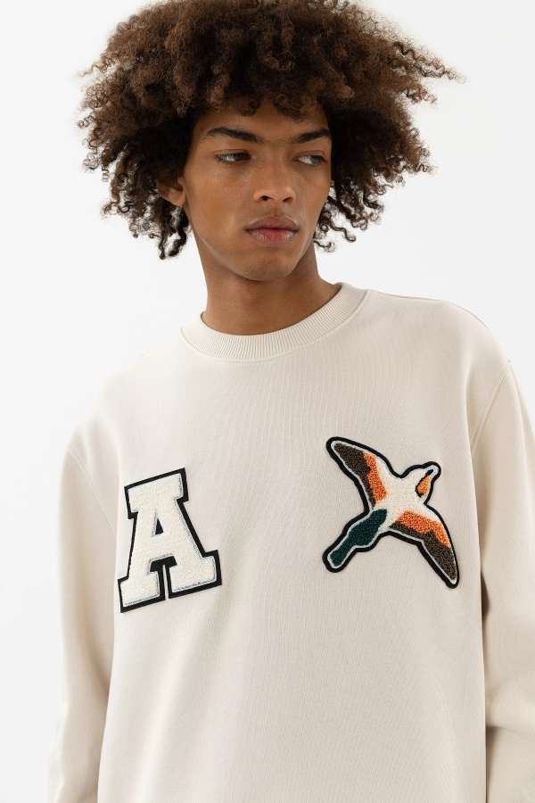 Varsity Bee Bird Sweatshirt Pale Beige Axel Arigato